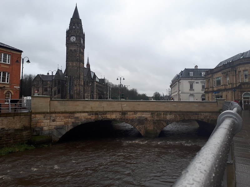 Rochdale Town Hall and the River Roch on a rainy day. March 2nd 2019. 