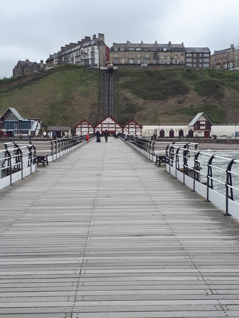 Saltburn Pier, looking back towards the town on the cliff above. The tramway can be seen if you squint, too. 2/5/19.