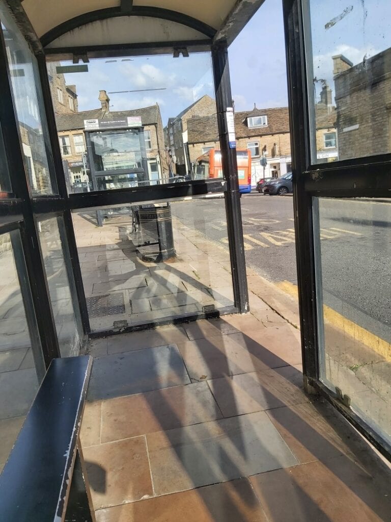 390 Bus on Henry Street in Glossop. The camber is a bit...odd.